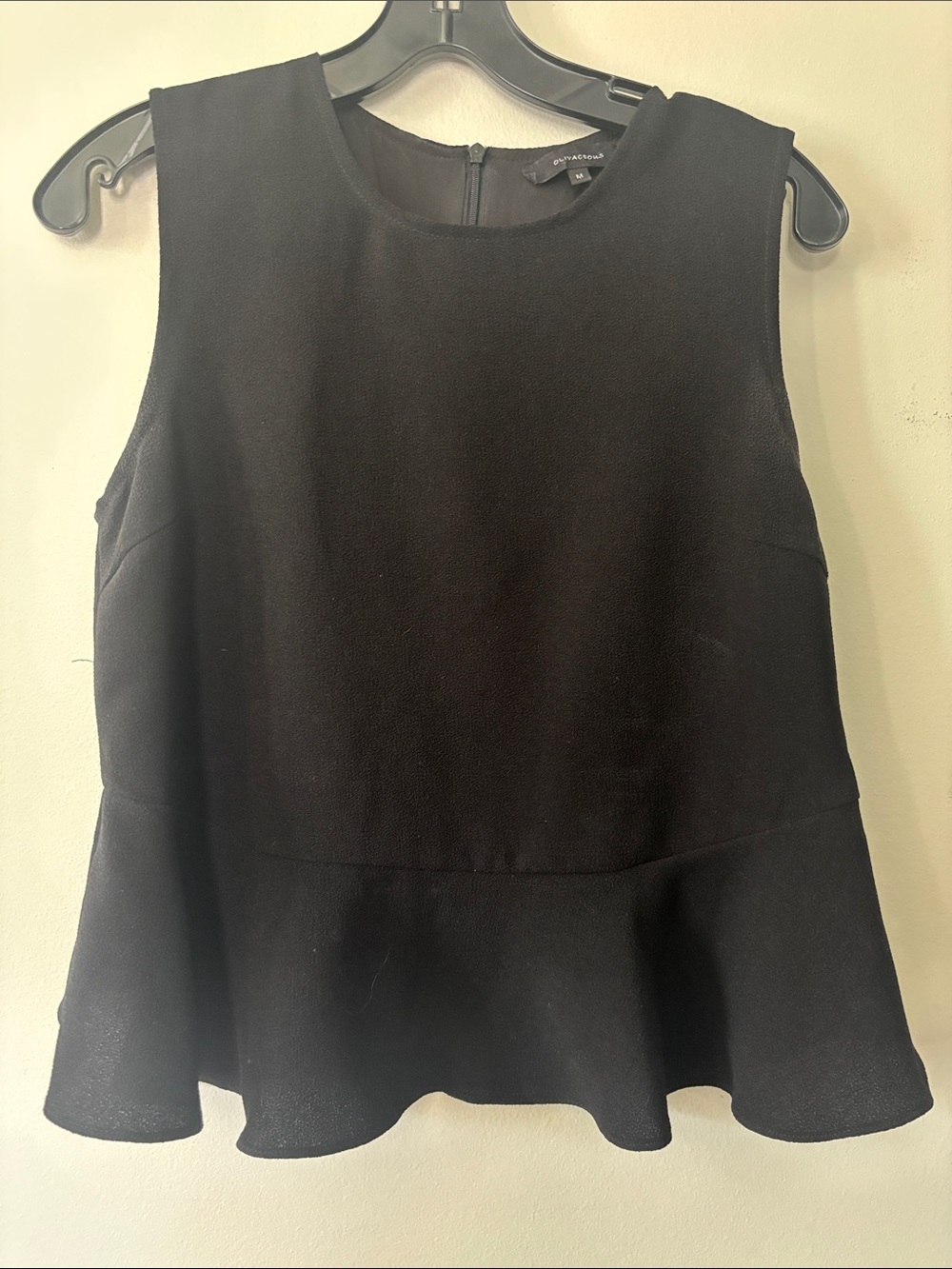 Olivaceous Black Sleeveless Peplum Tank Top